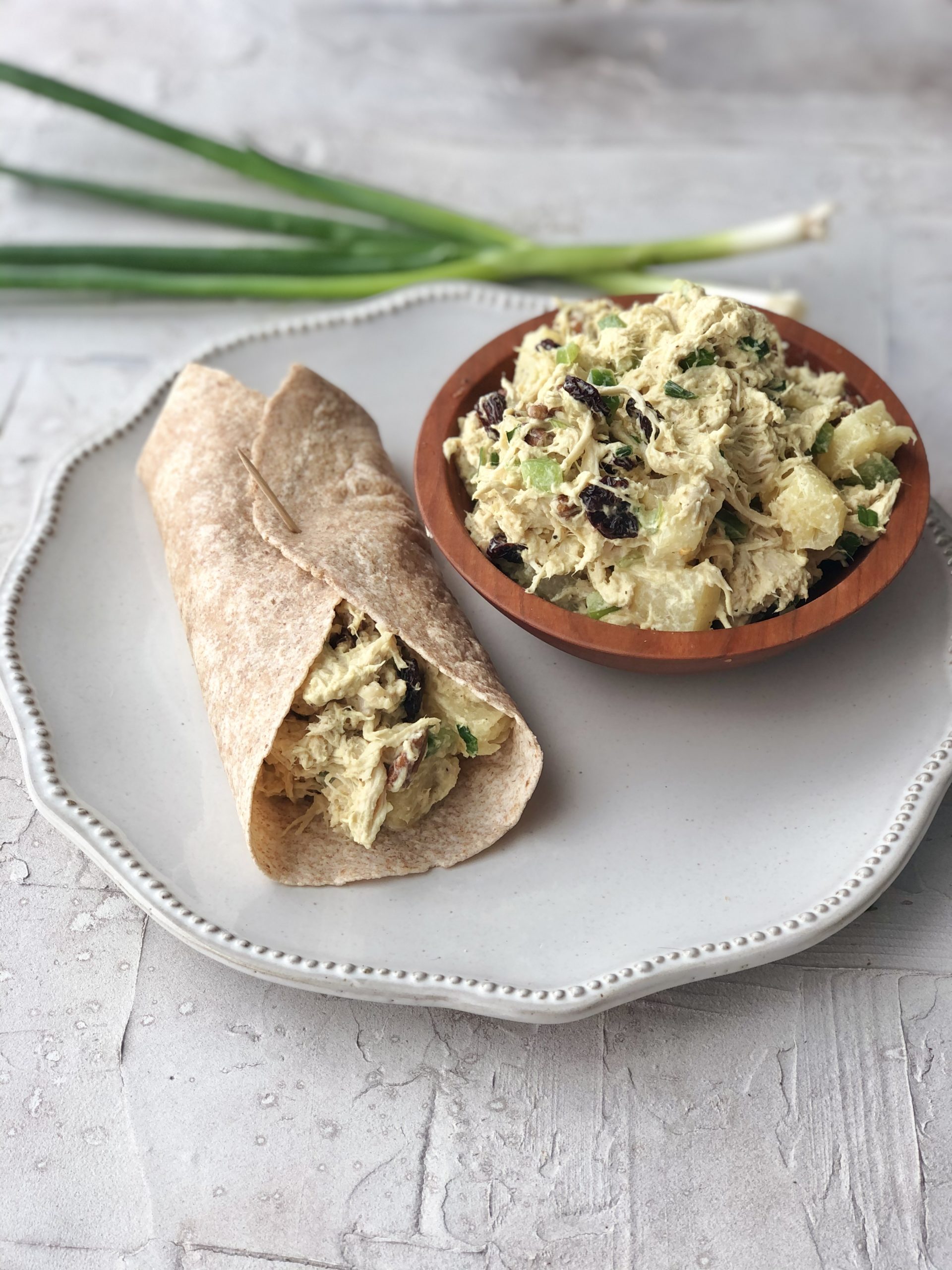 helathy chicken salad with pineapple, dried cherries, nuts, mayo greek yogurt, green onion, pecans, mustard for tasy and delicious wraps for spring and summer